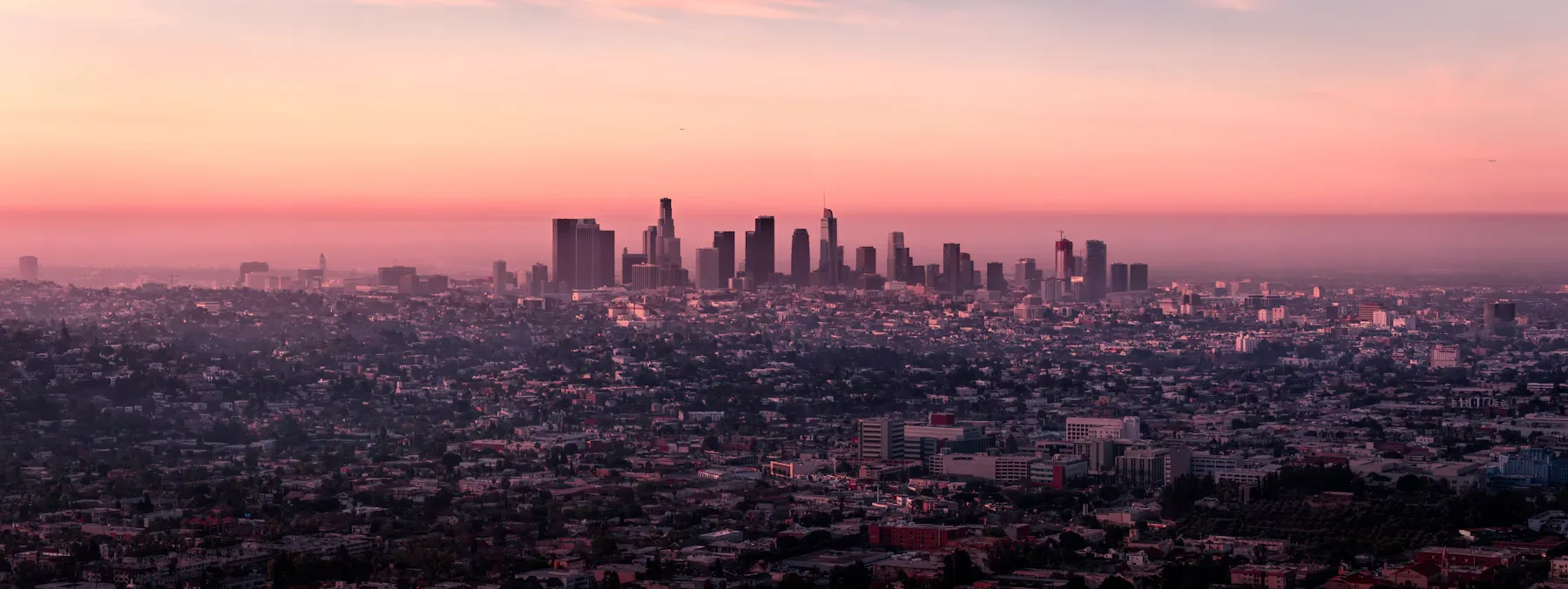 Los Angeles city skyline at sunset, home to businesses supported by Velan managed IT services