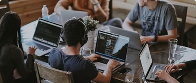 IT team collaborating remotely using cloud tools and managed IT support services in New York, USA.