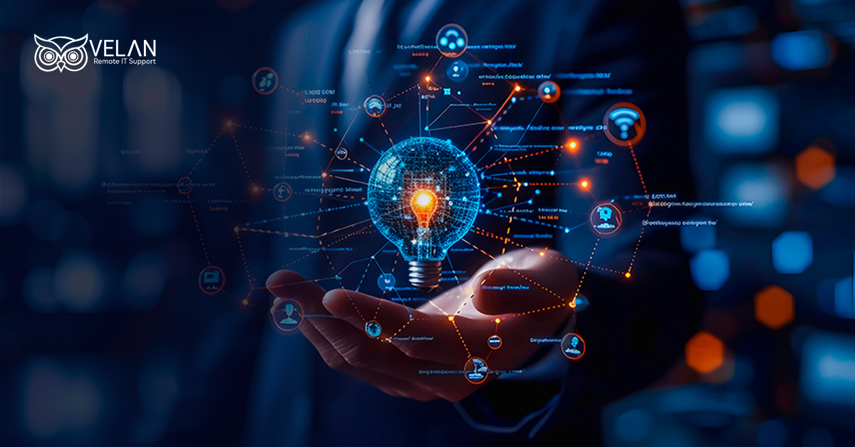 An abstract digital network with a glowing lightbulb floating above a businessman's open hand, featuring the Velan company logo in the top-left corner to illustrate cloud support IT services.